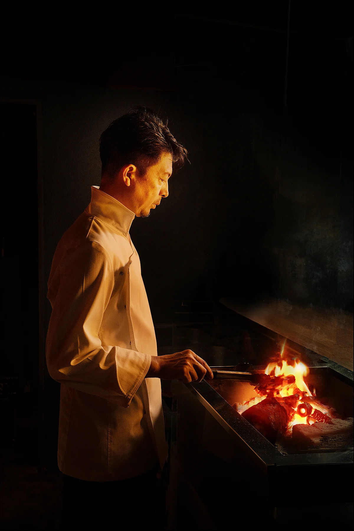 Kitchen staff working on a food production line